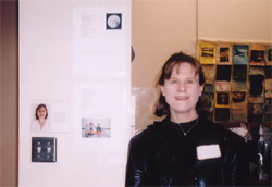 Sue in front of her Exhibit at St. Matthew's